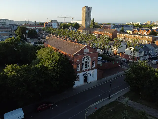 Aerial view of 42 Kent Street in Portsea at sunset, with Portsmouth Harbour beyond